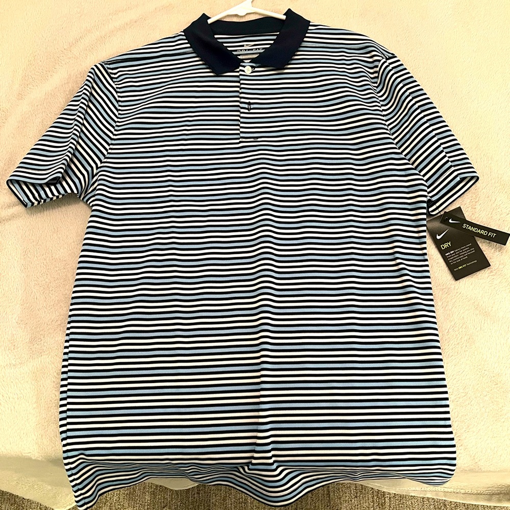 Brand new Nike golf polo size medium. White, black and blue.
